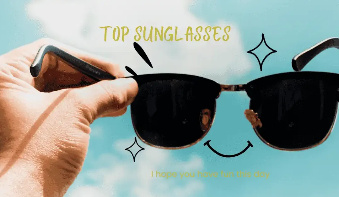 Close-up of a hand holding mens sunglasses against a bright blue sky, showcasing a stylish and fun choice for outdoor eye protection.