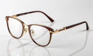 Elegant pair of luxury eyewear featuring gold accents and premium materials, combining timeless sophistication with superior craftsmanship.
